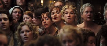 Movie still from “Pride & Prejudice” (2005), directed by Joe Wright – A group of people standing in a room; Close Up shot, High angle