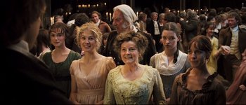 Movie still from “Pride & Prejudice” (2005), directed by Joe Wright – A group of people standing next to each other; Medium shot, High angle