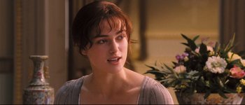 Movie still from “Pride & Prejudice” (2005), directed by Joe Wright – A person wearing a dress; Close Up shot, Over the shoulder angle