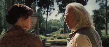 Movie still from “Pride & Prejudice” (2005), directed by Joe Wright – A man and a woman standing next to each other in a park; Close Up shot, Over the shoulder angle