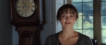 Movie still from “Pride & Prejudice” (2005), directed by Joe Wright – A young woman is smiling for the camera; Close Up shot, Over the shoulder angle