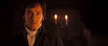 Movie still from “Pride & Prejudice” (2005), directed by Joe Wright – A person wearing a jacket; Close Up shot, Over the shoulder angle
