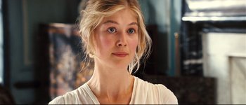 Movie still from “Pride & Prejudice” (2005), directed by Joe Wright – A beautiful young lady with blue eyes wearing a white shirt; Close Up shot, Over the shoulder angle