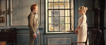 Movie still from “Pride & Prejudice” (2005), directed by Joe Wright – A man standing in front of an open window; Medium shot, Over the shoulder angle
