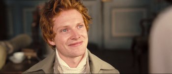 Movie still from “Pride & Prejudice” (2005), directed by Joe Wright – A person wearing a suit; Close Up shot, High angle