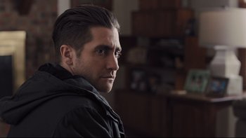 Movie still from “Prisoners” (2013), directed by Denis Villeneuve – A person wearing a black jacket; Close Up shot, Over the shoulder angle
