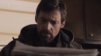 Movie still from “Prisoners” (2013), directed by Denis Villeneuve – A person with a beard; Close Up shot, Over the shoulder angle