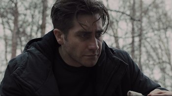 Movie still from “Prisoners” (2013), directed by Denis Villeneuve – A person wearing a black jacket; Close Up shot, Over the shoulder angle
