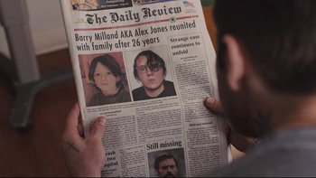 Movie still from “Prisoners” (2013), directed by Denis Villeneuve – A person reading a newspaper with the front page of a newspaper; Extreme Close Up shot, High angle