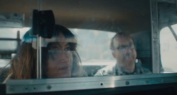 Movie still from “Private Life” (2018), directed by Tamara Jenkins – A woman and a man in the back seat of a car; Close Up shot, Over the shoulder angle