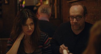 Movie still from “Private Life” (2018), directed by Tamara Jenkins – A man and a woman sitting at a table in a restaurant; Close Up shot, Over the shoulder angle