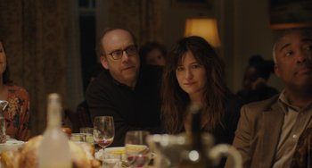 Movie still from “Private Life” (2018), directed by Tamara Jenkins – A man and a woman sitting at a dinner table; Close Up shot, Over the shoulder angle