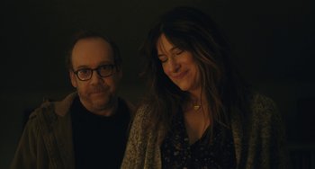 Movie still from “Private Life” (2018), directed by Tamara Jenkins – A man and a woman standing next to each other; Close Up shot, Over the shoulder angle