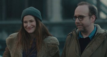 Movie still from “Private Life” (2018), directed by Tamara Jenkins – A man and a woman standing next to each other on the street; Close Up shot, Over the shoulder angle