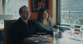 Movie still from “Private Life” (2018), directed by Tamara Jenkins – A man and a woman sitting in front of a computer; Medium shot, High angle