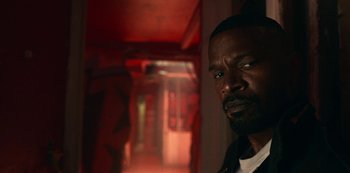 Movie still from “Project Power” (2020), directed by Henry Joost – Close Up shot, Low angle