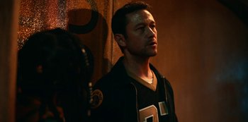 Movie still from “Project Power” (2020), directed by Henry Joost – A person standing in a dark room; Close Up shot, Over the shoulder angle