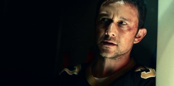 Movie still from “Project Power” (2020), directed by Henry Joost – A person in a dark room; Close Up shot, Low angle