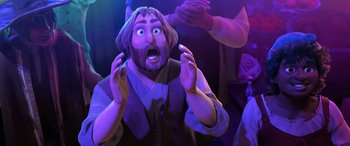 Movie still from “Puss in Boots: The Last Wish” (2022), directed by Januel Mercado – A man with a surprised look on his face; Medium shot, Over the shoulder angle