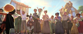 Movie still from “Puss in Boots: The Last Wish” (2022), directed by Januel Mercado – A group of people standing next to each other; Wide shot, Low angle