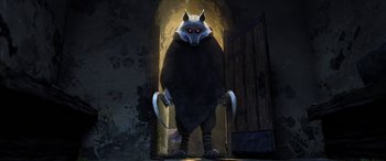 Movie still from “Puss in Boots: The Last Wish” (2022), directed by Januel Mercado – An animated creature is standing in the dark; Wide shot, Low angle