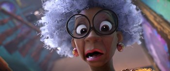 Movie still from “Puss in Boots: The Last Wish” (2022), directed by Januel Mercado – An old woman with a surprised look on her face; Close Up shot, Low angle