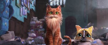 Movie still from “Puss in Boots: The Last Wish” (2022), directed by Januel Mercado – An orange cat sitting on top of a pile of rocks; Close Up shot, Low angle