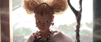 Movie still from “Puss in Boots: The Last Wish” (2022), directed by Januel Mercado – A woman with blonde hair wearing a white shirt and a necklace; Close Up shot, Low angle