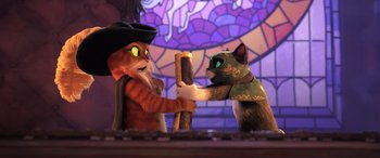 Movie still from “Puss in Boots: The Last Wish” (2022), directed by Januel Mercado – A cat and a mouse are fighting over a wooden stick; Medium shot, Over the shoulder angle