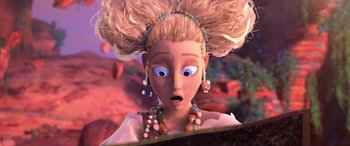 Movie still from “Puss in Boots: The Last Wish” (2022), directed by Januel Mercado – A cartoon character with a surprised look on its face; Close Up shot, Over the shoulder angle