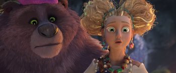 Movie still from “Puss in Boots: The Last Wish” (2022), directed by Januel Mercado – A woman and a stuffed animal are standing next to each other; Close Up shot, Low angle