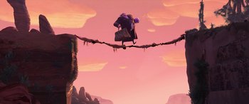 Movie still from “Puss in Boots: The Last Wish” (2022), directed by Januel Mercado – A person is balancing on a rope in the sky; Wide shot, Low angle