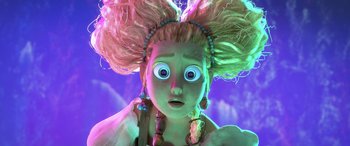 Movie still from “Puss in Boots: The Last Wish” (2022), directed by Januel Mercado – A woman's face with a strange look on her face; Close Up shot, Low angle