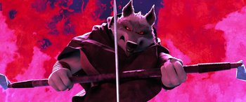 Movie still from “Puss in Boots: The Last Wish” (2022), directed by Januel Mercado – An image of an anime character with a sword; Medium shot, Low angle