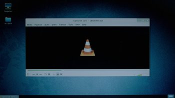 Movie still from “Mr. Robot” (2015), created by Sam Esmail – A computer screen with a cone on the screen; Extreme Close Up shot, Overhead angle