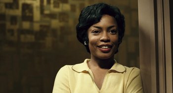 Movie still from “Ray” (2004), directed by Taylor Hackford – An older black woman smiling for the camera; Close Up shot, Low angle