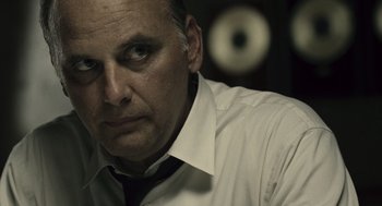 A person wearing a shirt and a tie