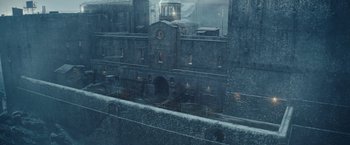 Movie still from “Red Notice” (2021), directed by Rawson Marshall Thurber – A view of an old building from a window; Extreme Wide shot, High angle