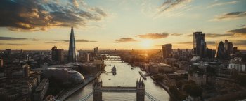 Movie still from “Red Notice” (2021), directed by Rawson Marshall Thurber – A view of a river with a bridge in the middle of it; Extreme Wide shot, High angle
