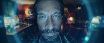 Movie still from “Red Notice” (2021), directed by Rawson Marshall Thurber – A man's face with a beard; Extreme Close Up shot, Overhead angle