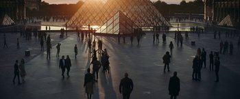 Movie still from “Red Notice” (2021), directed by Rawson Marshall Thurber – A group of people walking in front of a building; Extreme Wide shot, High angle