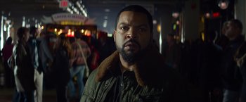 Movie still from “Ride Along” (2014), directed by Tim Story – A person wearing a jacket; Close Up shot, Over the shoulder angle