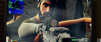 Movie still from “Ride Along” (2014), directed by Tim Story – A man with a beard is holding a gun; Extreme Close Up shot, Overhead angle