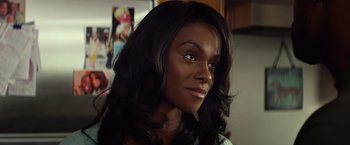 Movie still from “Ride Along” (2014), directed by Tim Story – A person with long black hair; Close Up shot, Over the shoulder angle