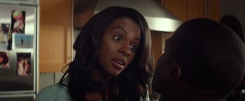 Movie still from “Ride Along” (2014), directed by Tim Story – A person with long black hair; Close Up shot, Over the shoulder angle