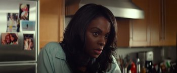 Movie still from “Ride Along” (2014), directed by Tim Story – A person with long black hair; Close Up shot, Over the shoulder angle