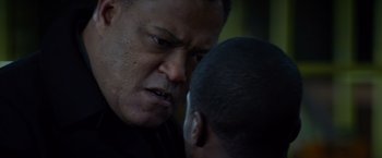 Movie still from “Ride Along” (2014), directed by Tim Story – A person talking to another person; Close Up shot, Low angle