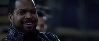 Movie still from “Ride Along” (2014), directed by Tim Story – A person wearing a leather jacket; Close Up shot, Over the shoulder angle