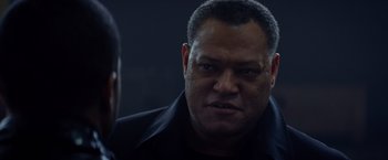 Movie still from “Ride Along” (2014), directed by Tim Story – A man that is staring at the camera; Close Up shot, Over the shoulder angle