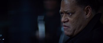 Movie still from “Ride Along” (2014), directed by Tim Story – A man's face in the dark; Close Up shot, Over the shoulder angle